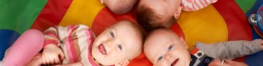 Overhead View Of Babies Having Fun At Nursery Playgroup